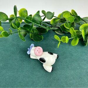 Vintage Mini Black And White Cow Figurine Laying on Back